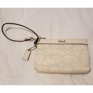 Coach ivory perforated leather wristlet